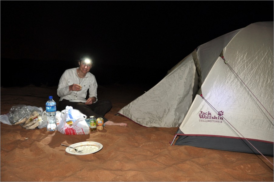 after dinner in the dark night we tried to sleep in the sandstorm surrounding us